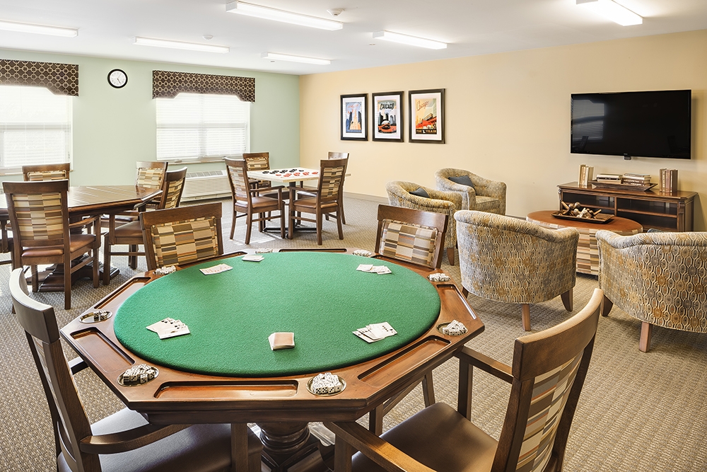 Common area with card tables and seating