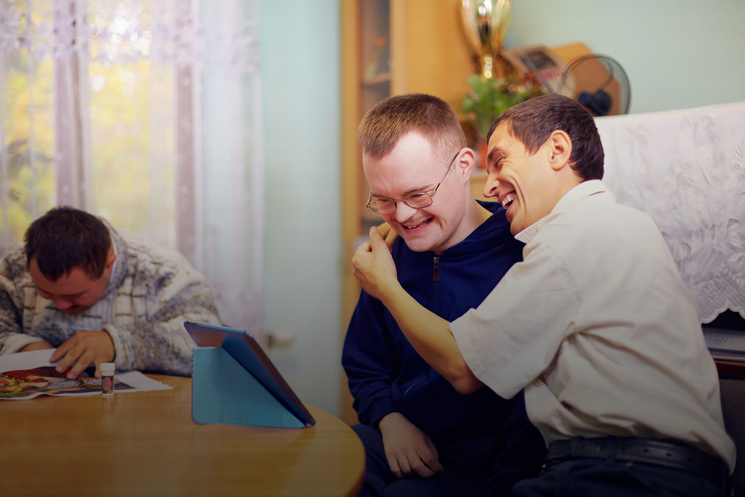 Residents laughing and enjoying an interactive moment.