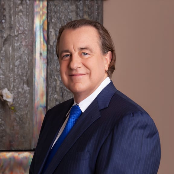 Professional portrait of a man in a suit