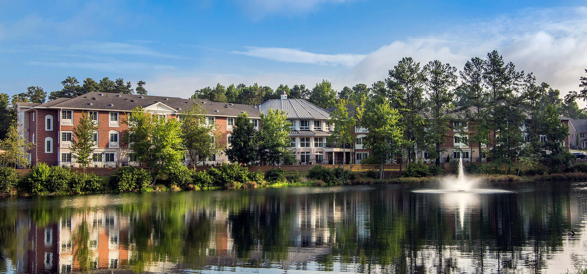 Exterior view of The Sheridan at Eastside by the lake