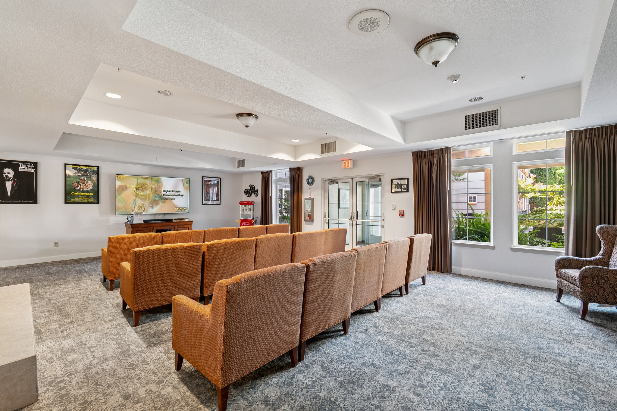 Interior common area with seating and natural light