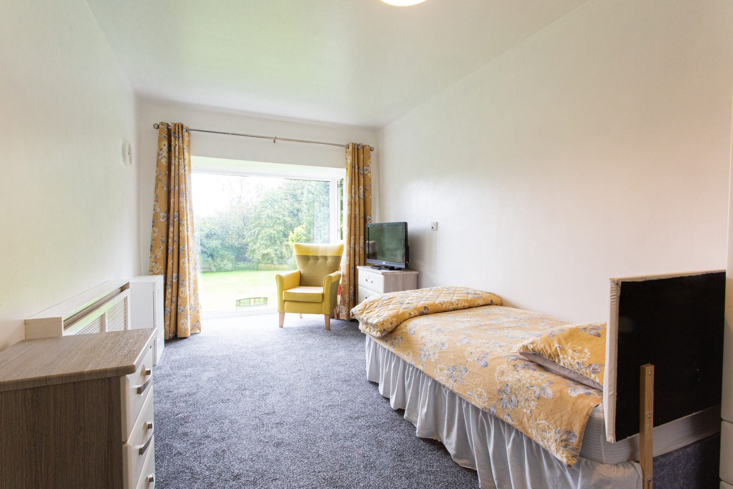 Cozy resident room with a view of the garden