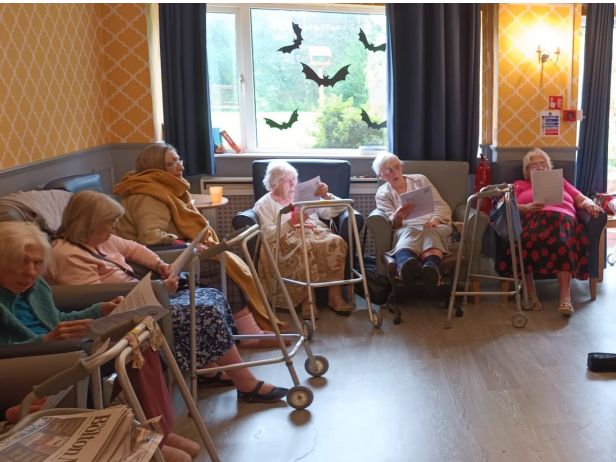 Residents enjoying time together in a common area.