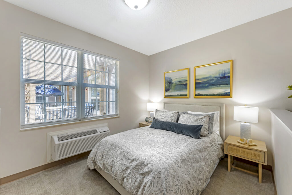 Cozy bedroom with artwork and natural light