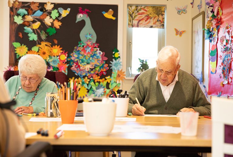 Residents engaging in an arts and crafts activity