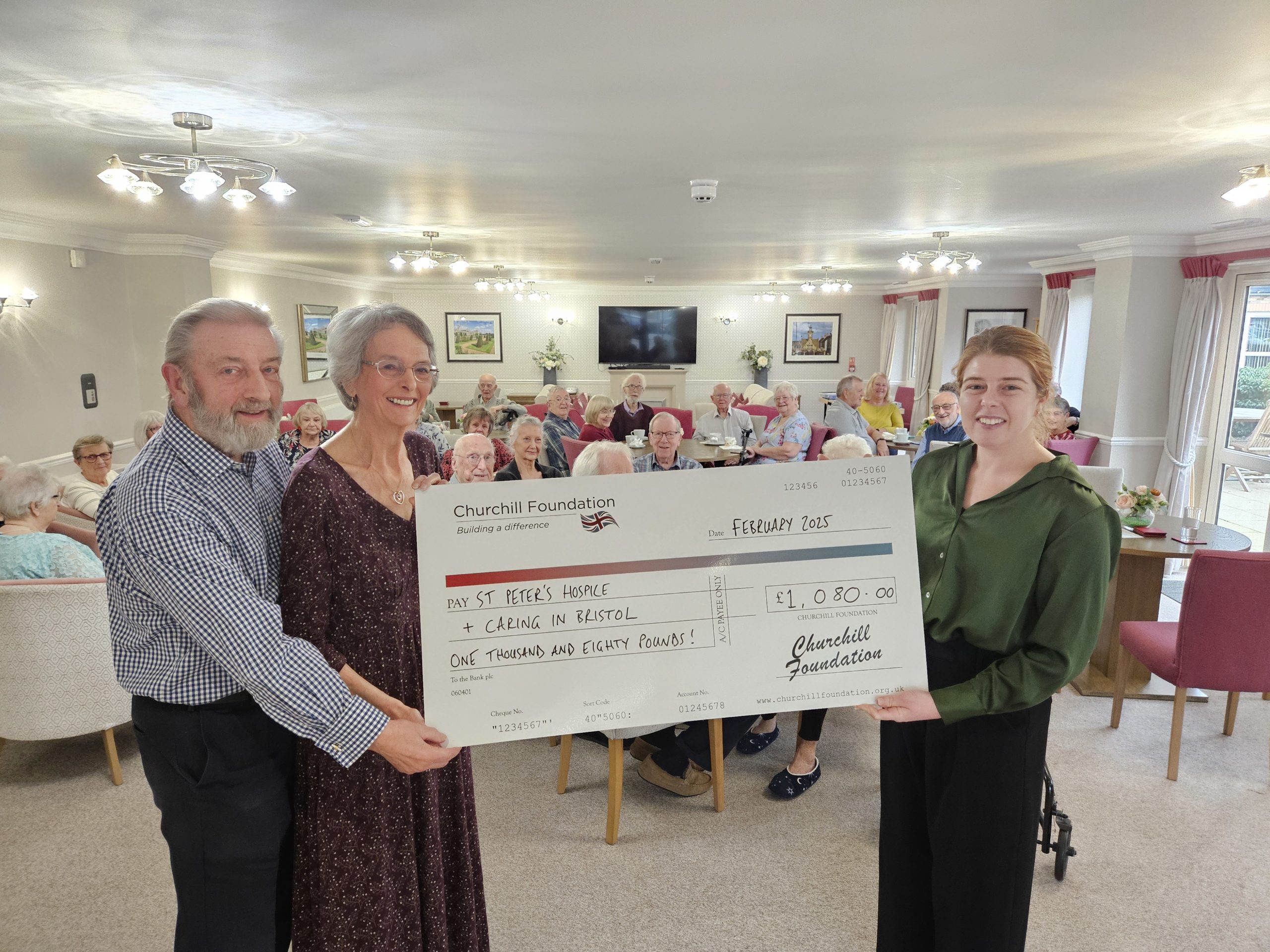 Residents and staff celebrating a fundraising event