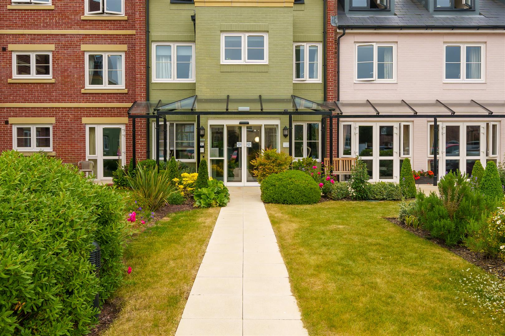 Exterior view of a welcoming assisted living facility.
