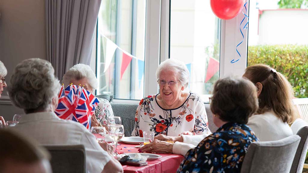 Residents enjoying a celebratory dining event