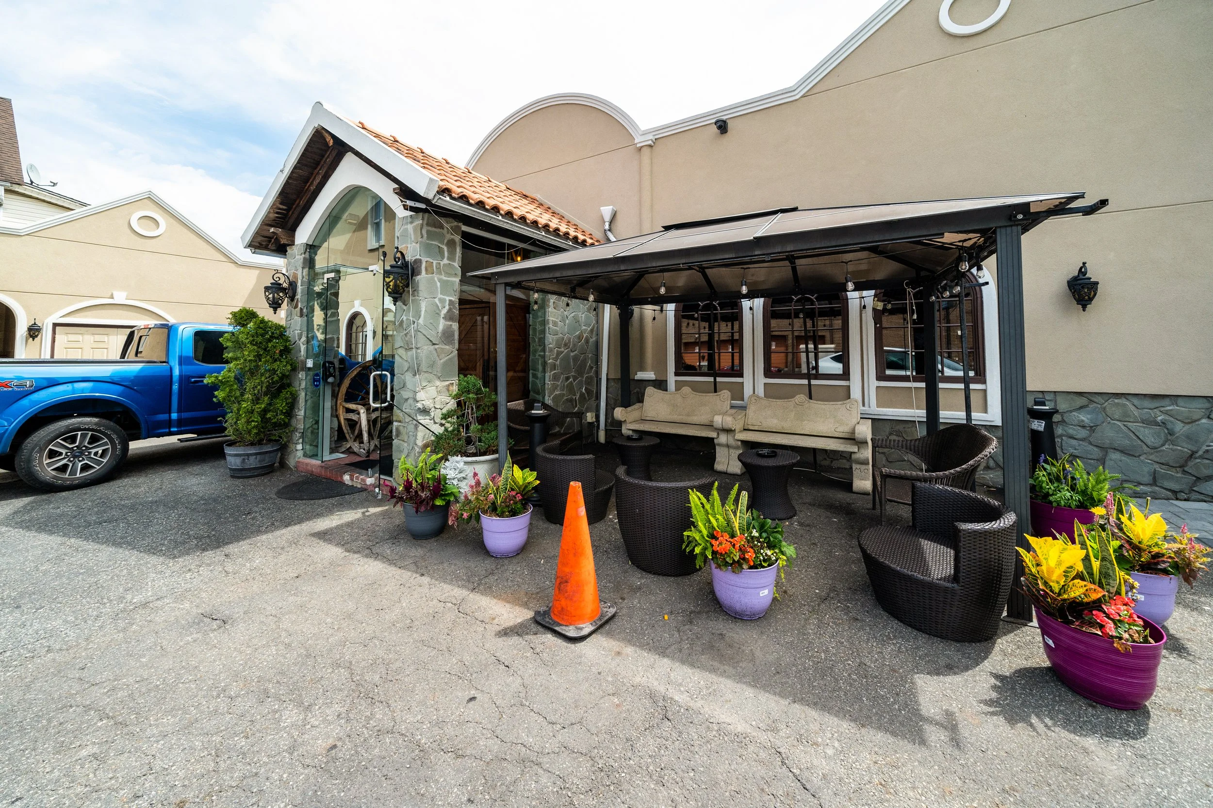 Outdoor seating area with colorful plants