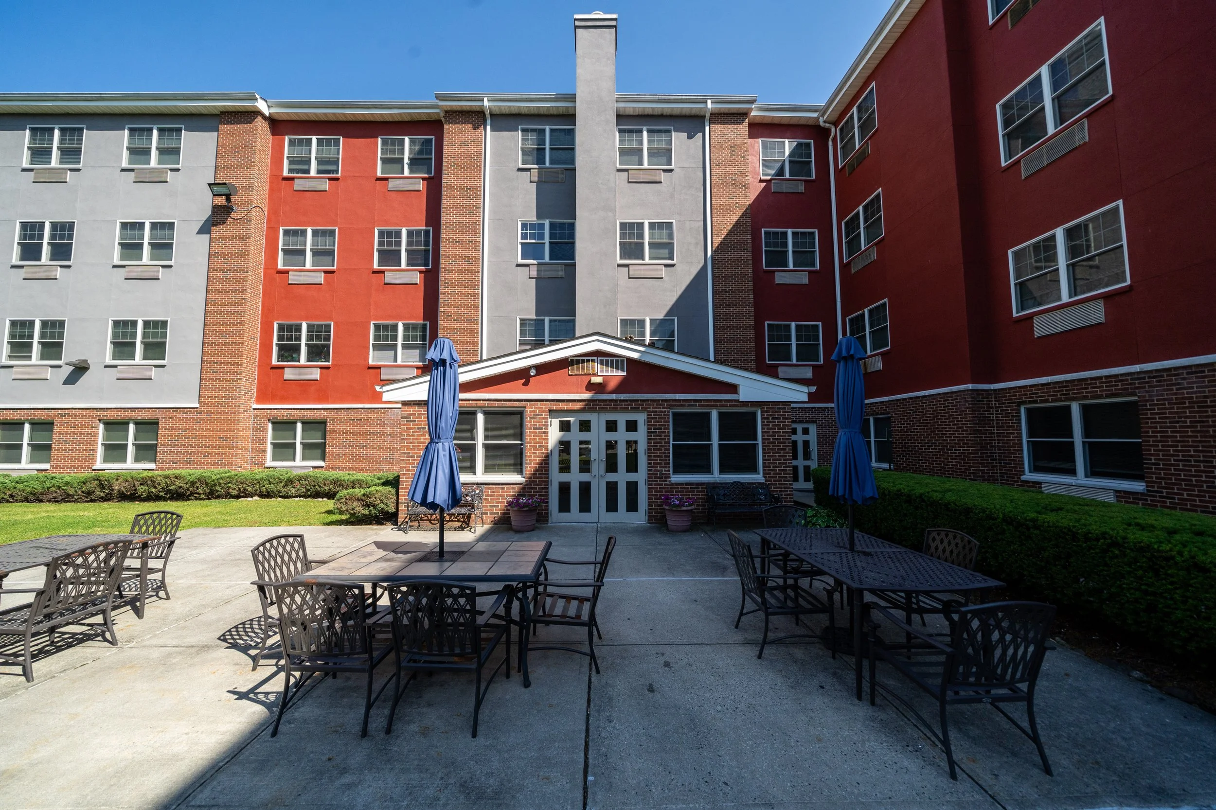 Outdoor seating area in front of the facility