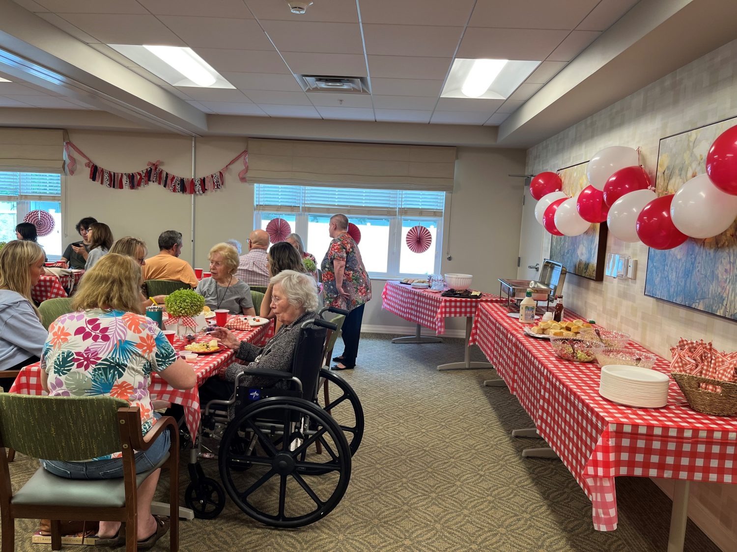 Residents enjoying a festive meal in a common area