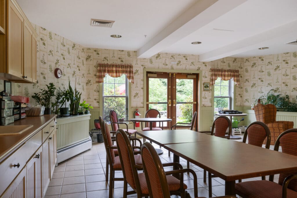 Bright common area with tables and chairs