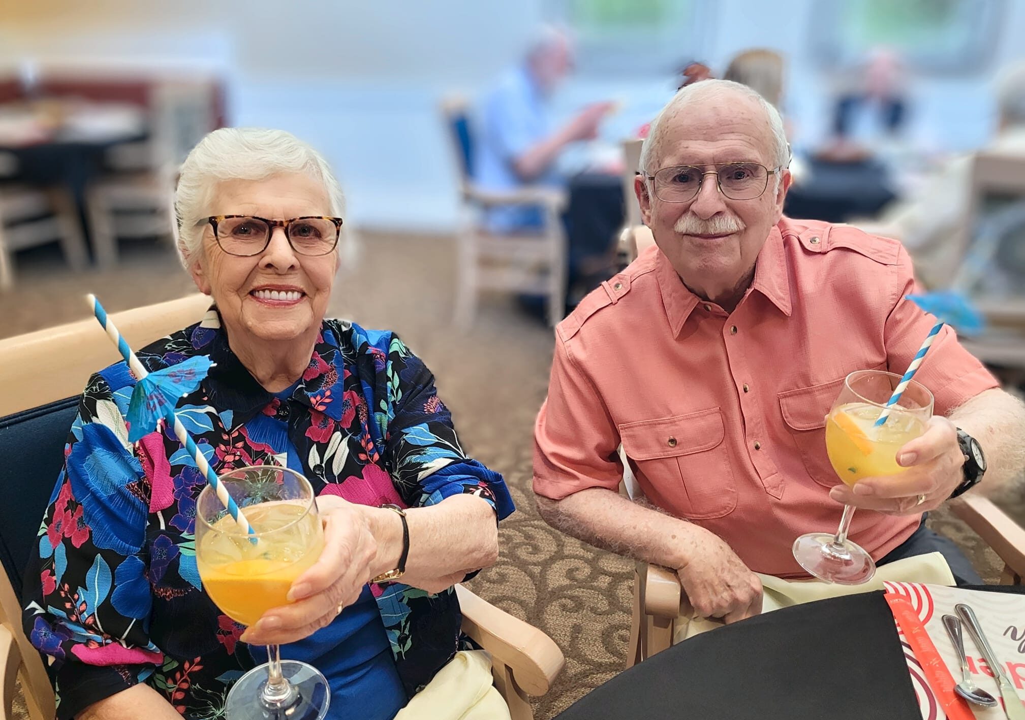 Residents enjoying drinks at a social gathering