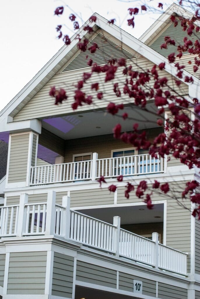 Exterior view of a residential facility with decorative foliage