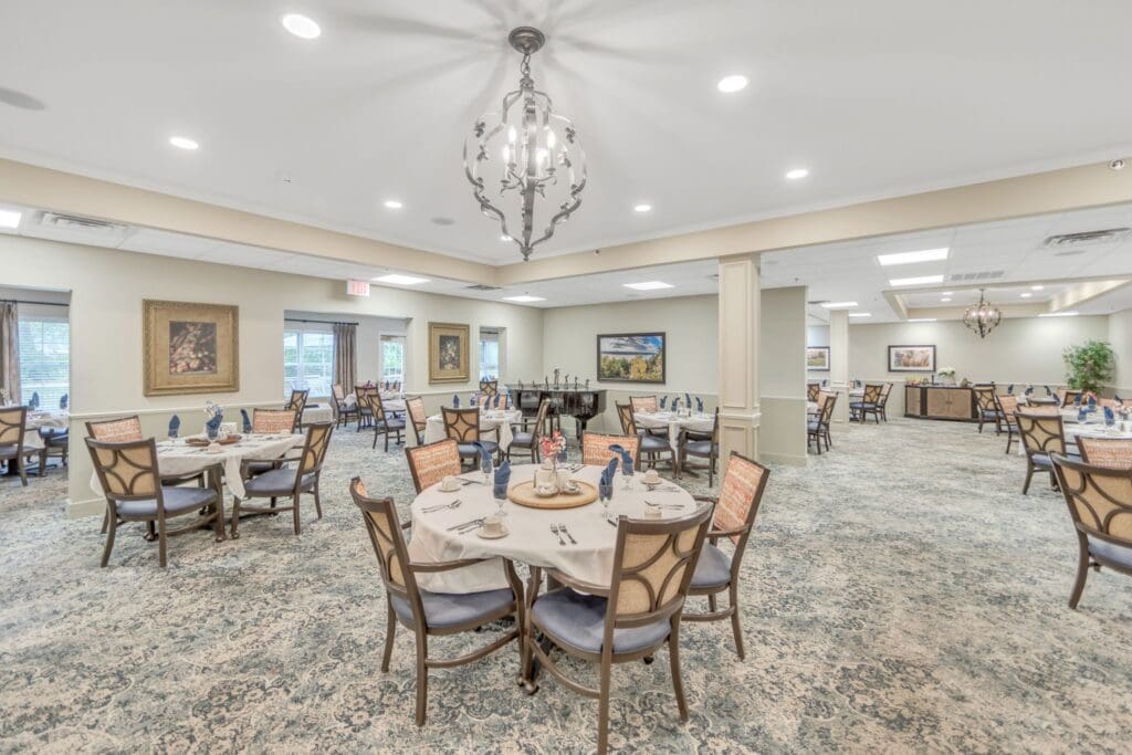 Interior dining area with set tables and decor