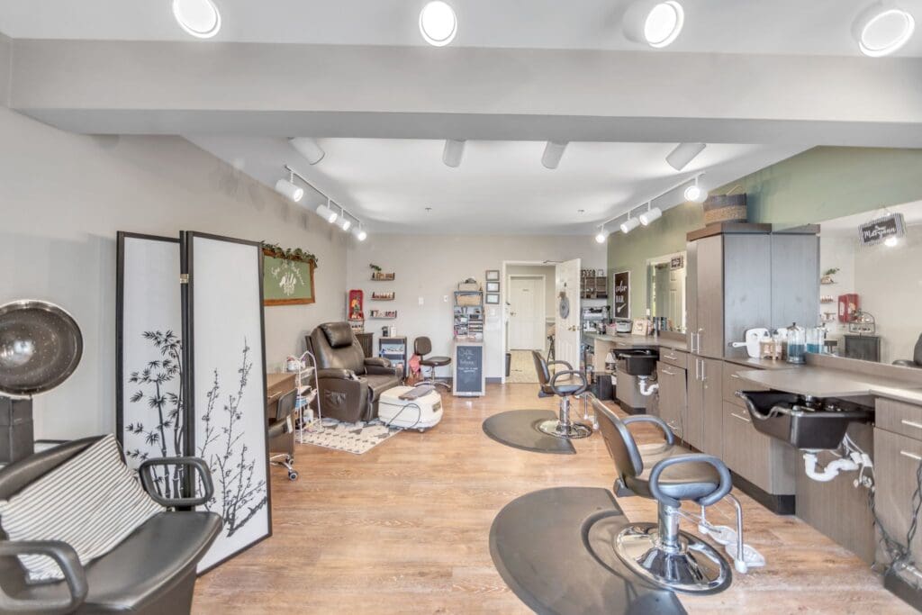 Interior view of a salon area with styling stations