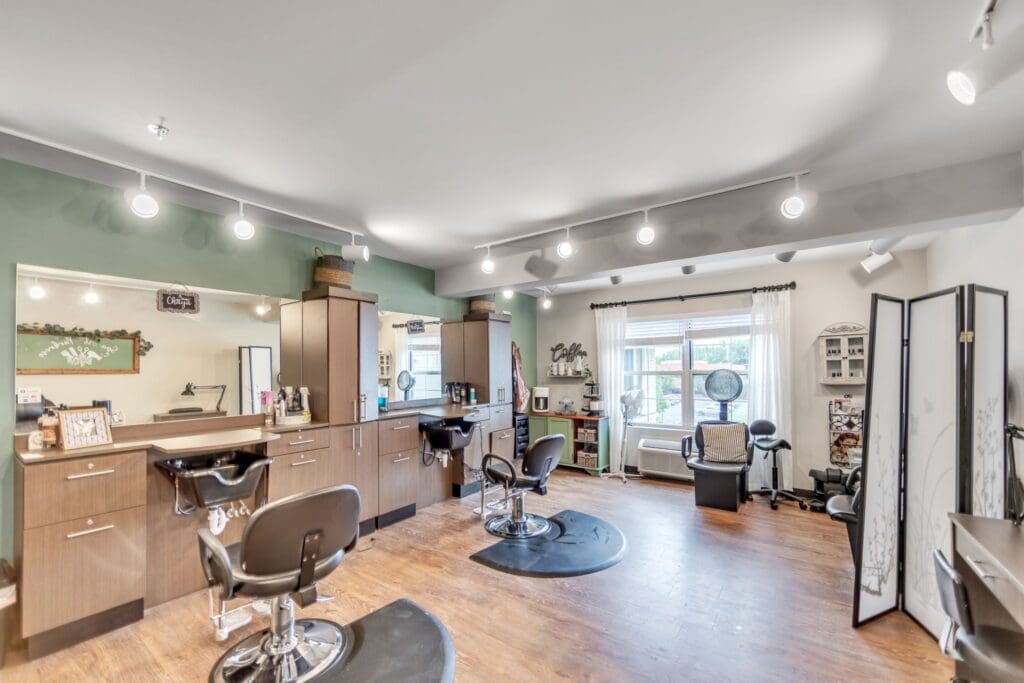 Interior of a salon with styling chairs and mirrors