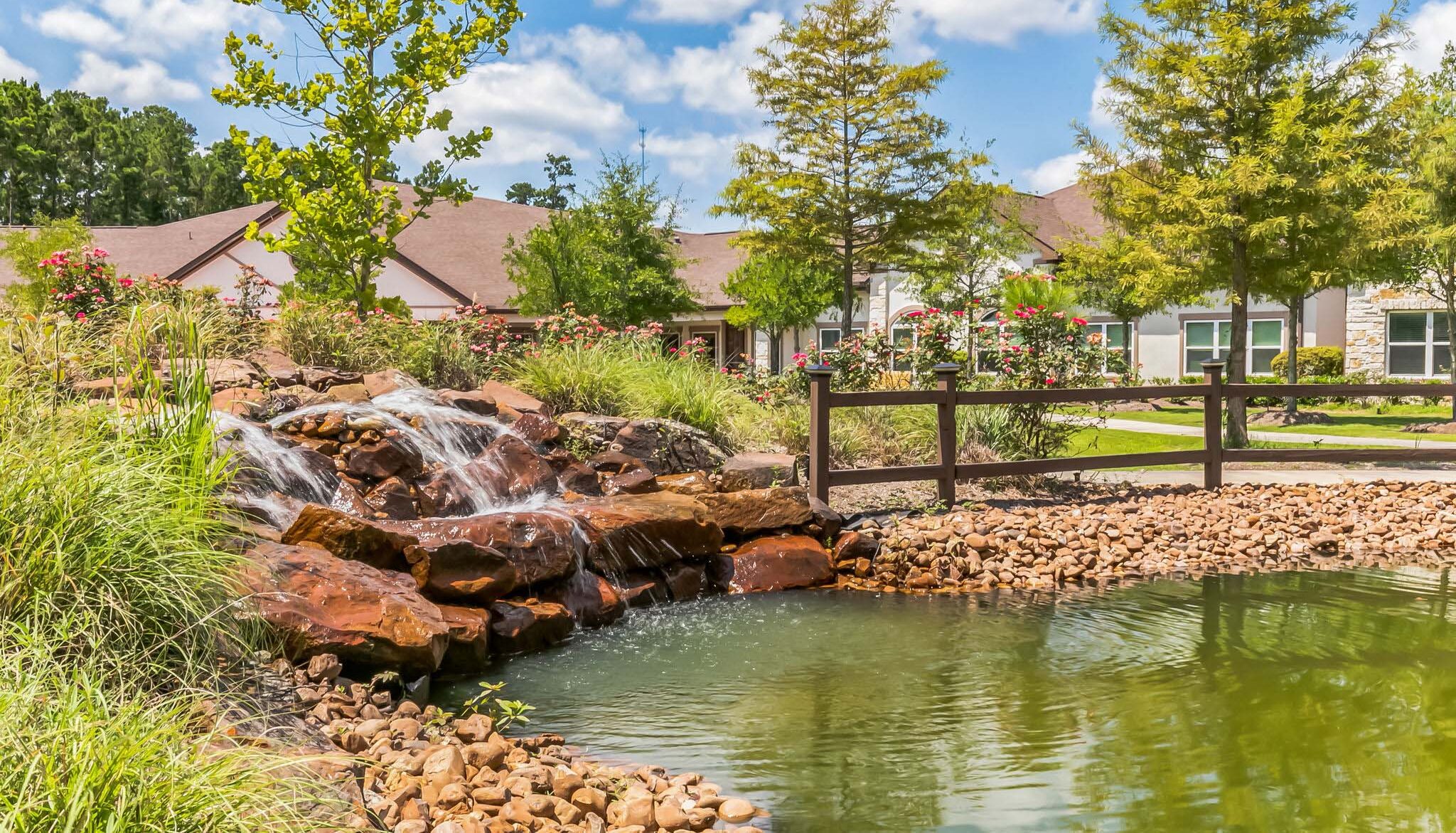 Beautiful outdoor space with a pond and waterfall