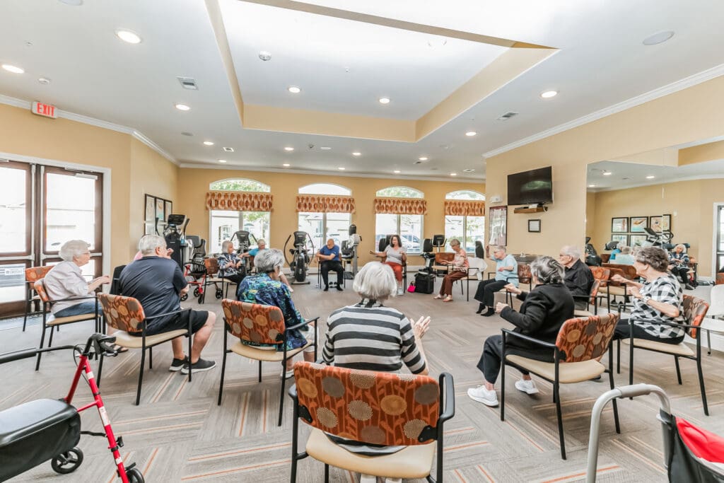 Residents participating in a group activity in a common area