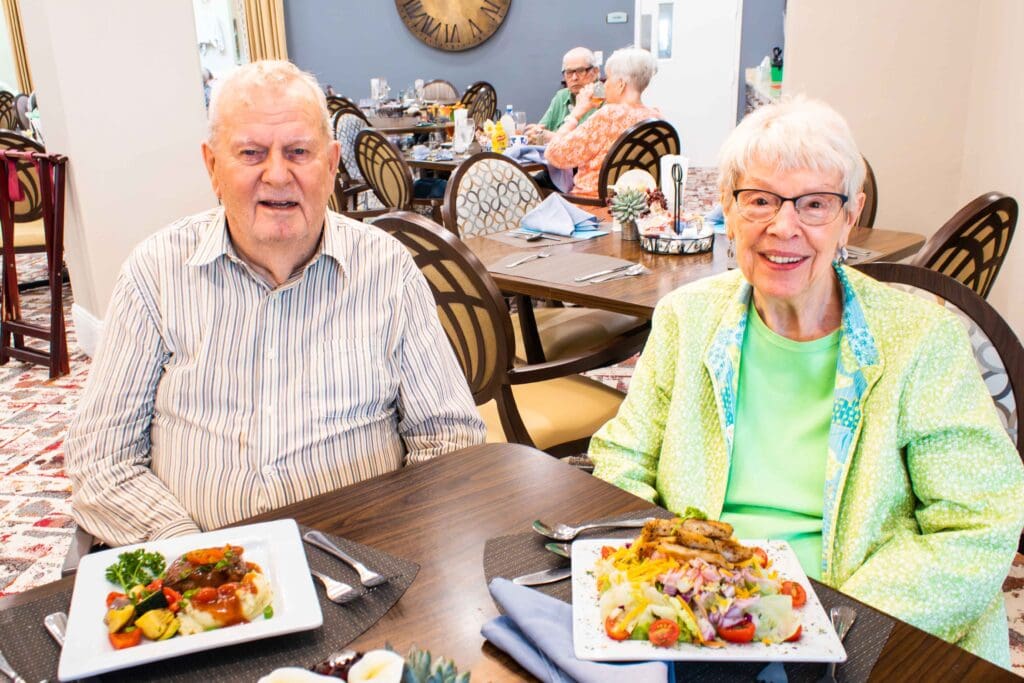 Residents enjoying meals in the dining area