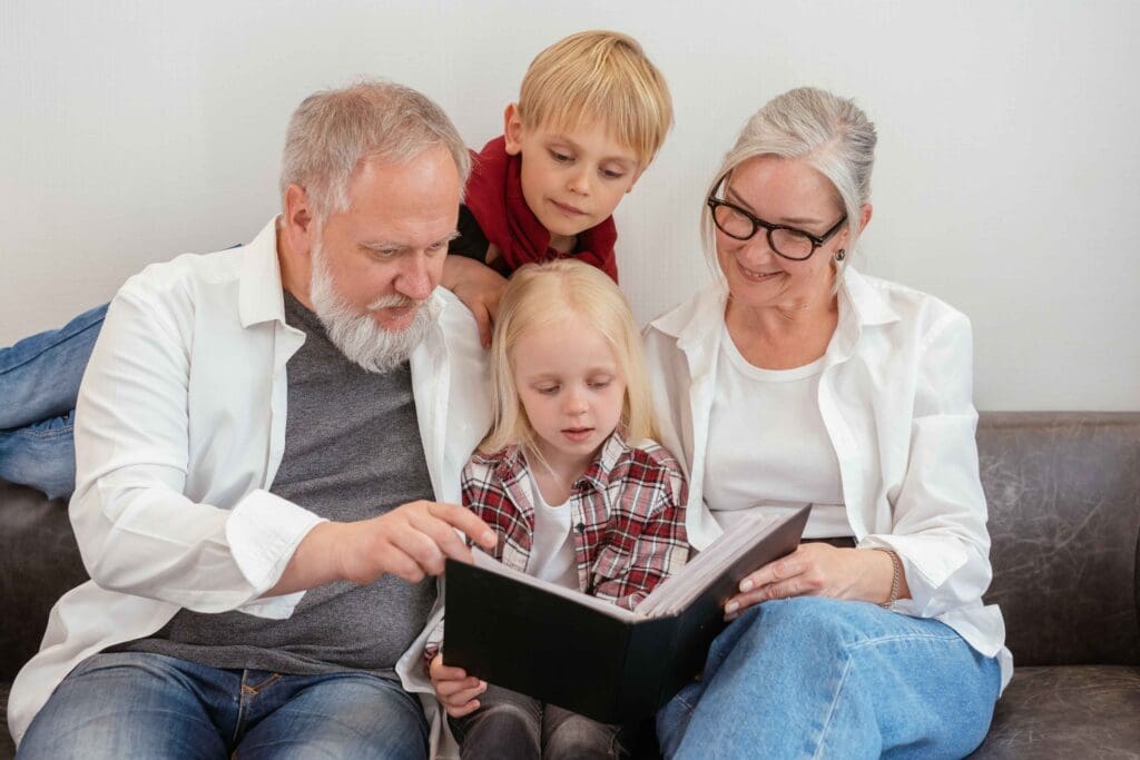 Family reading together in a cozy indoor setting