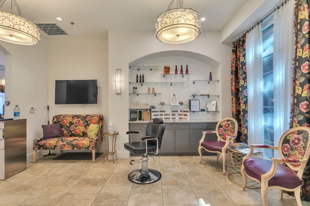 Interior view of a salon area with floral decor