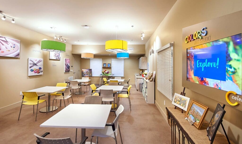 Interior of a colorful activity room with tables