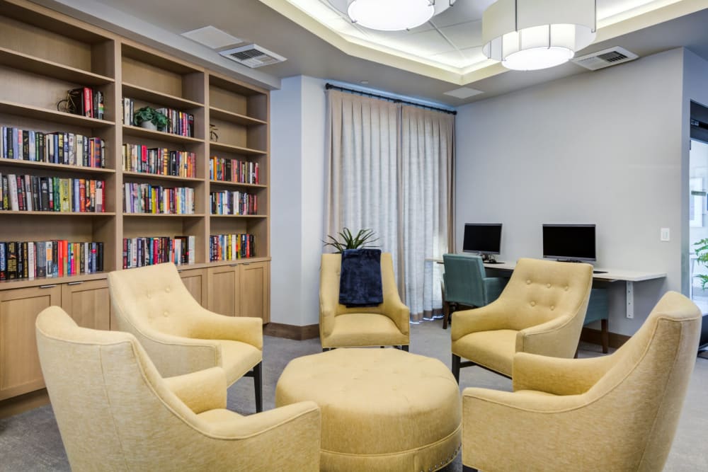 Cozy common area with seating and bookshelves