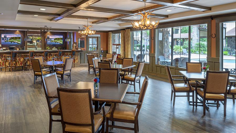 Bright dining area with tables and chairs