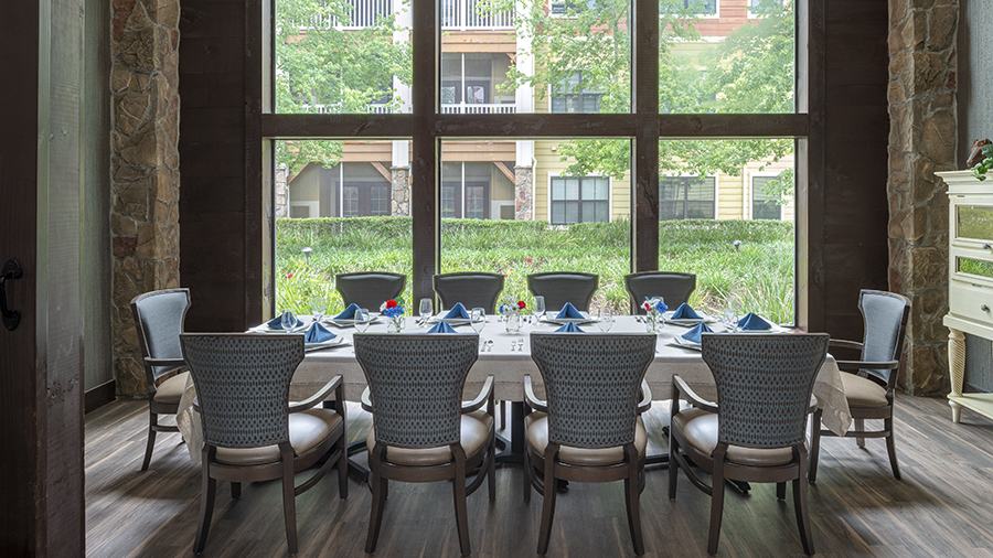 Dining room with a large table set for a meal