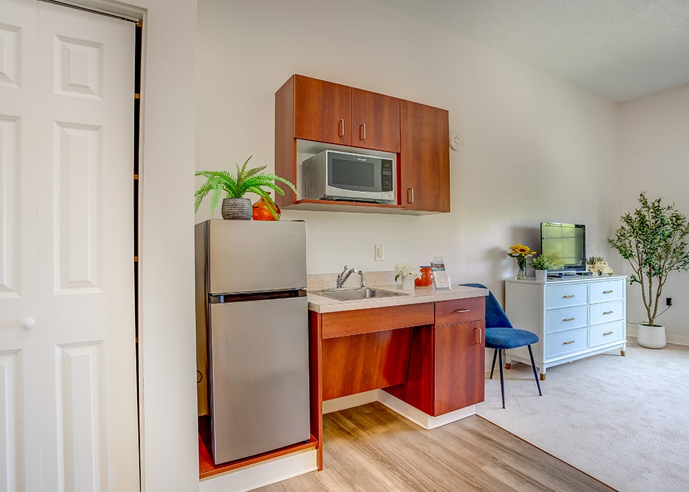 Cozy kitchenette area in a resident's room