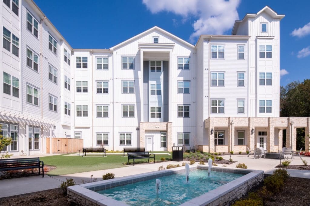 Exterior view of the facility with water fountain