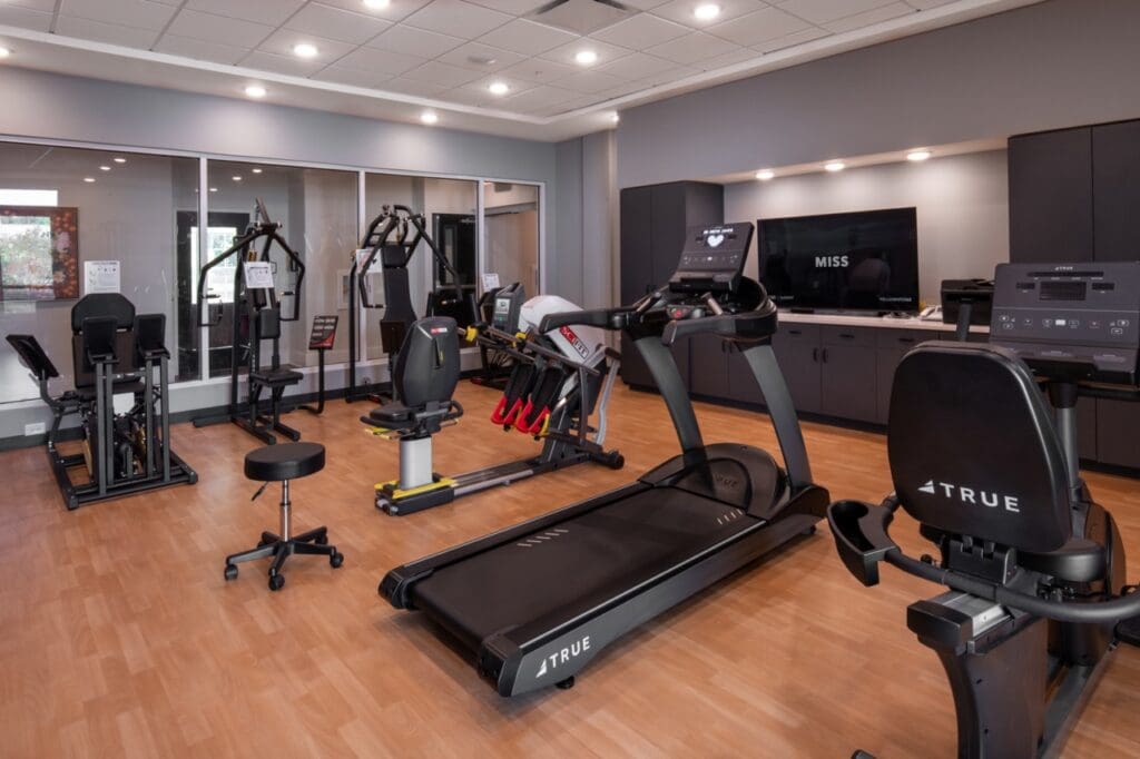 Interior view of a fitness area with exercise equipment