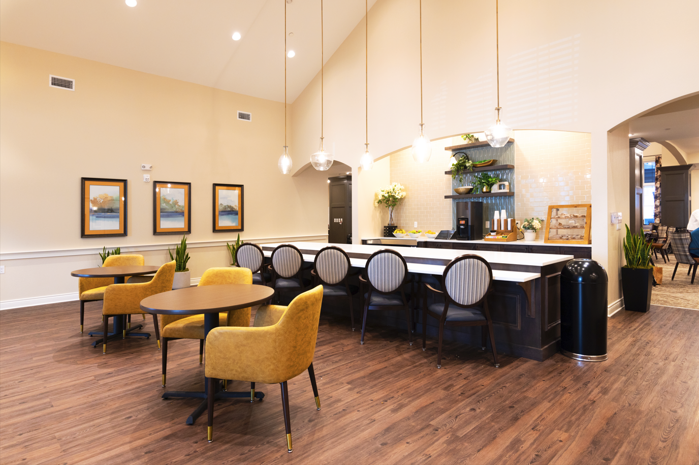 Interior view of a common area with seating and bar.