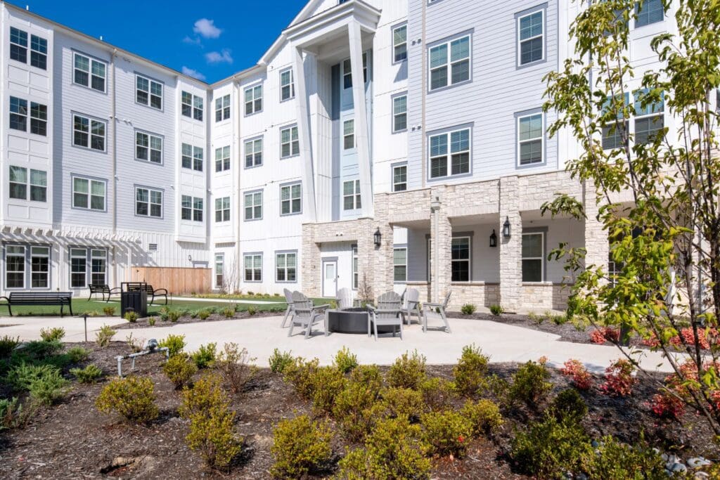 Outdoor space with seating and landscaped garden