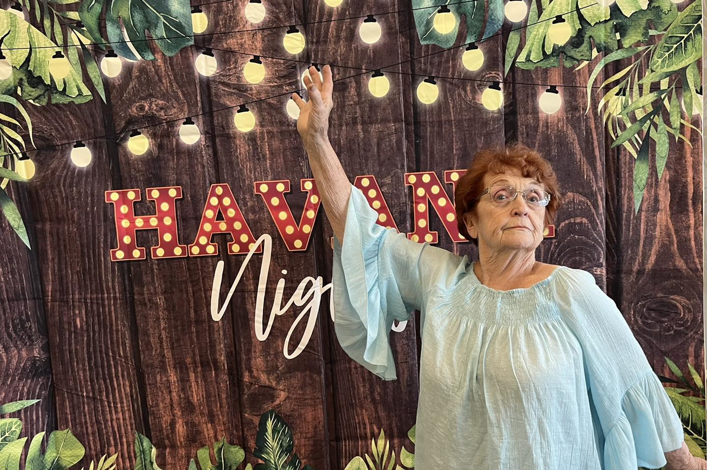 Resident participating in a themed event with decorations