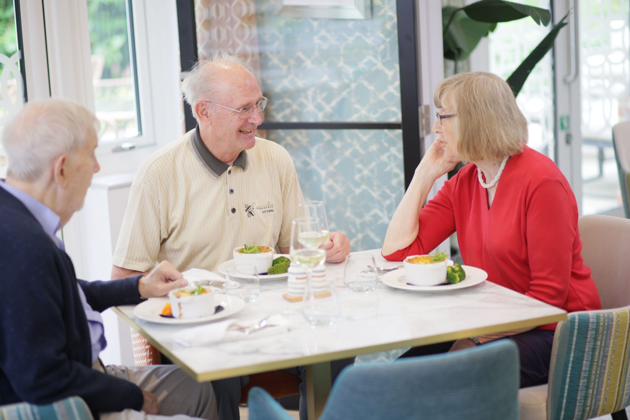 Residents enjoying lunch together in the dining area