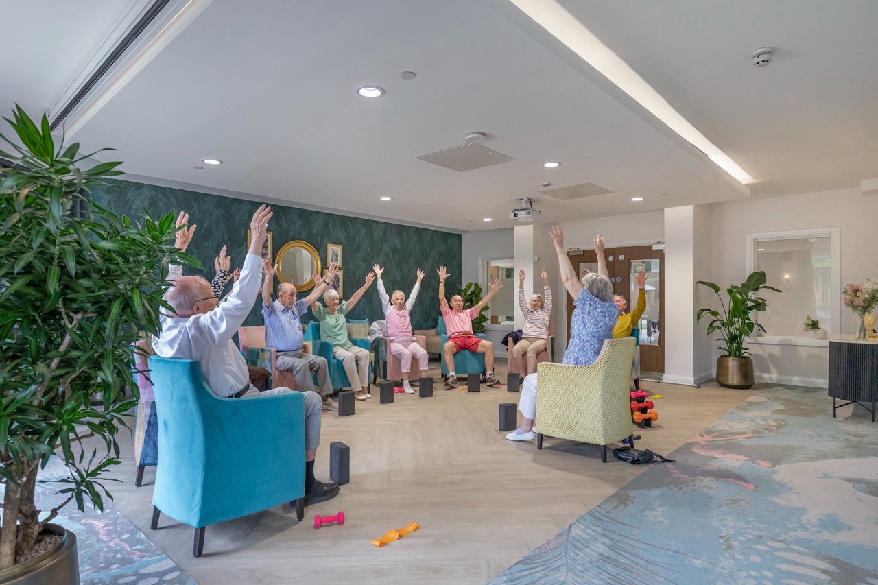 Residents participating in a group exercise class