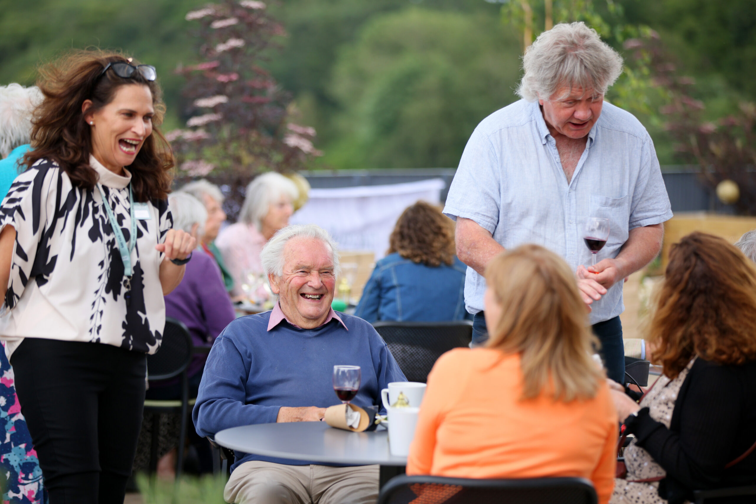Residents enjoying a social gathering outdoors