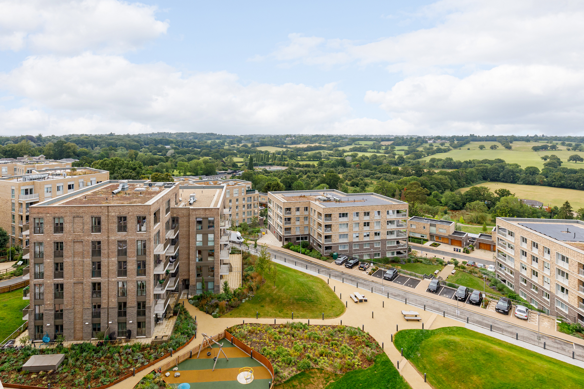 Aerial view of Woodbank Apartments and surrounding landscape