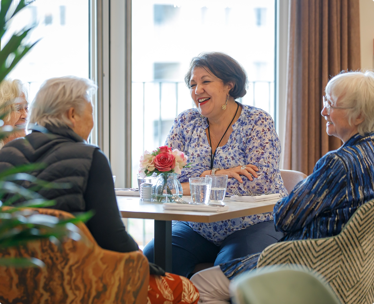 Residents enjoying conversation in a common area