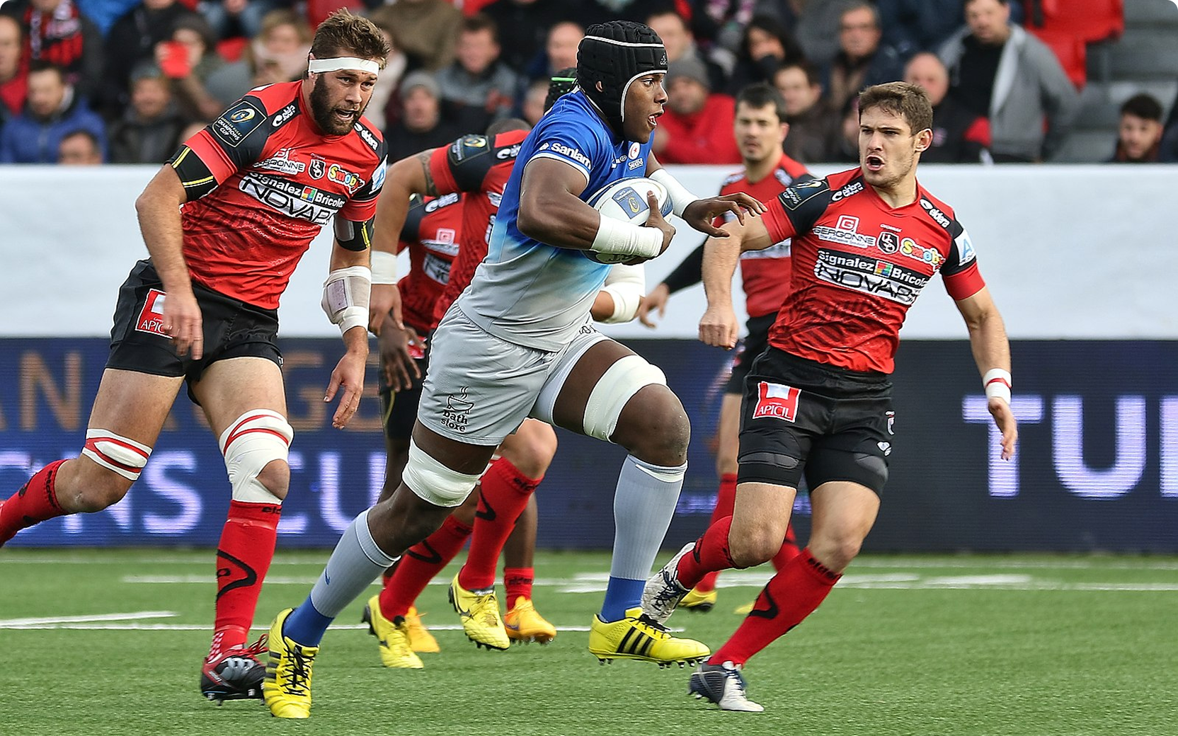 Rugby players in a competitive match