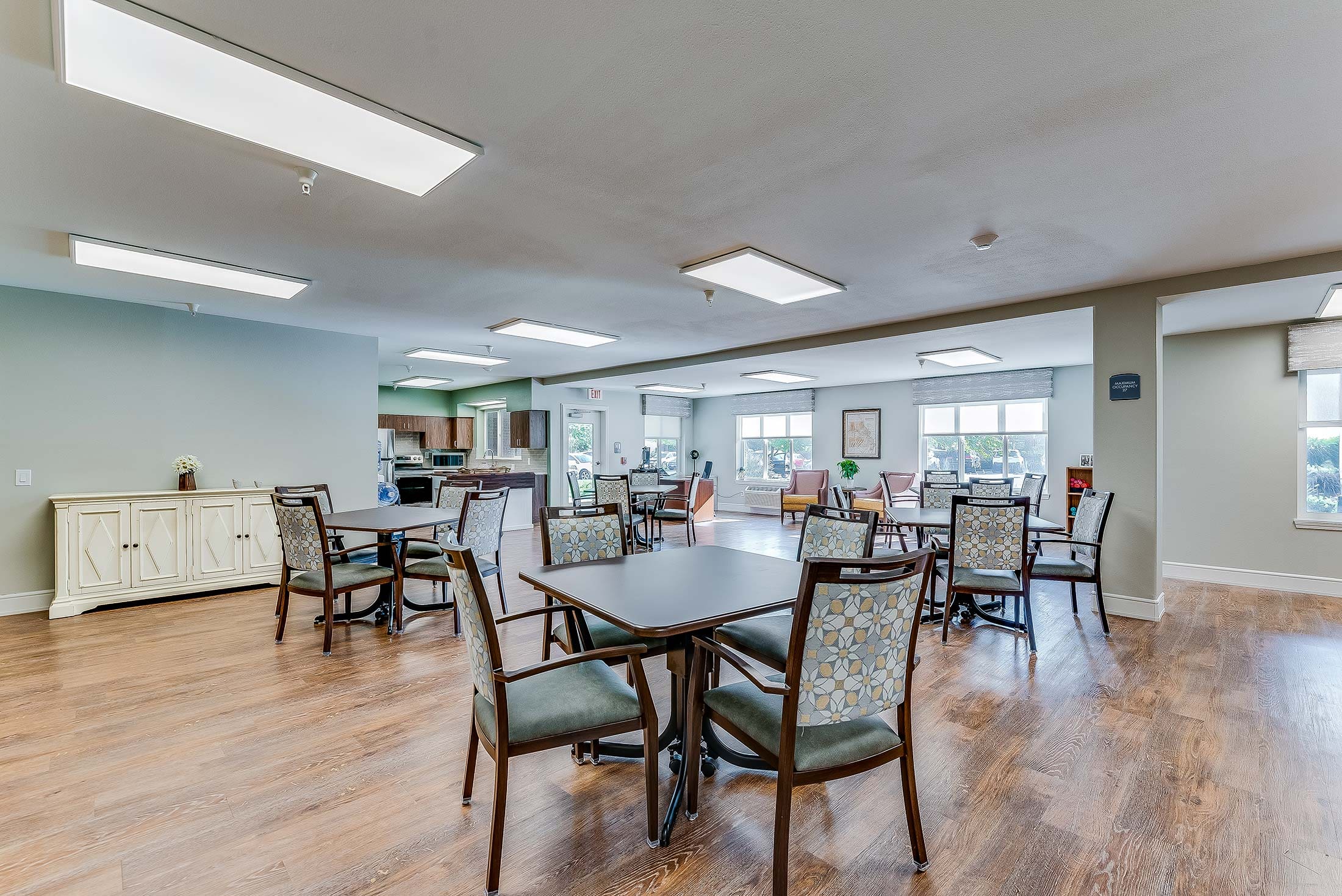Spacious dining area with tables and chairs