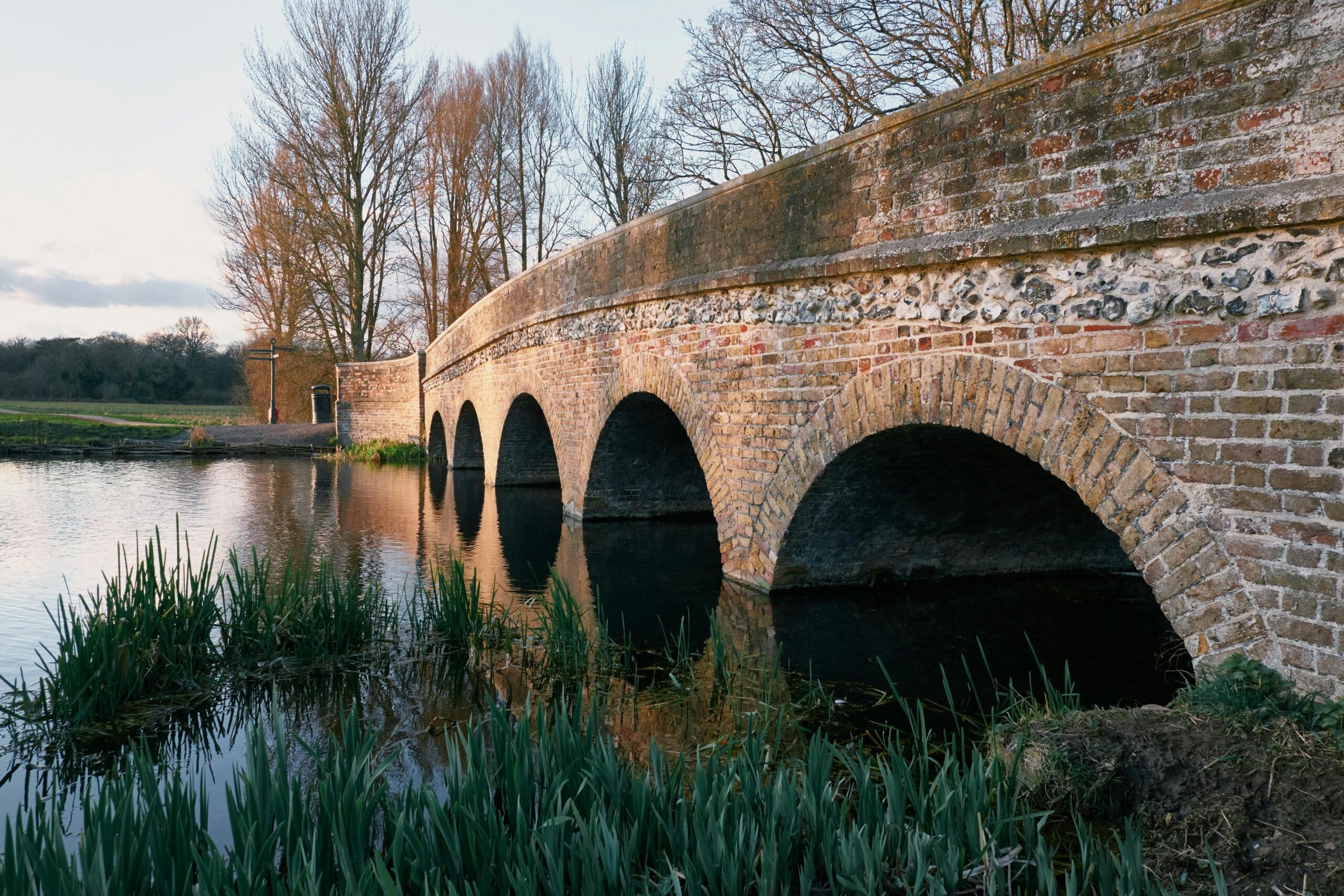 A scenic view of a bridge over water