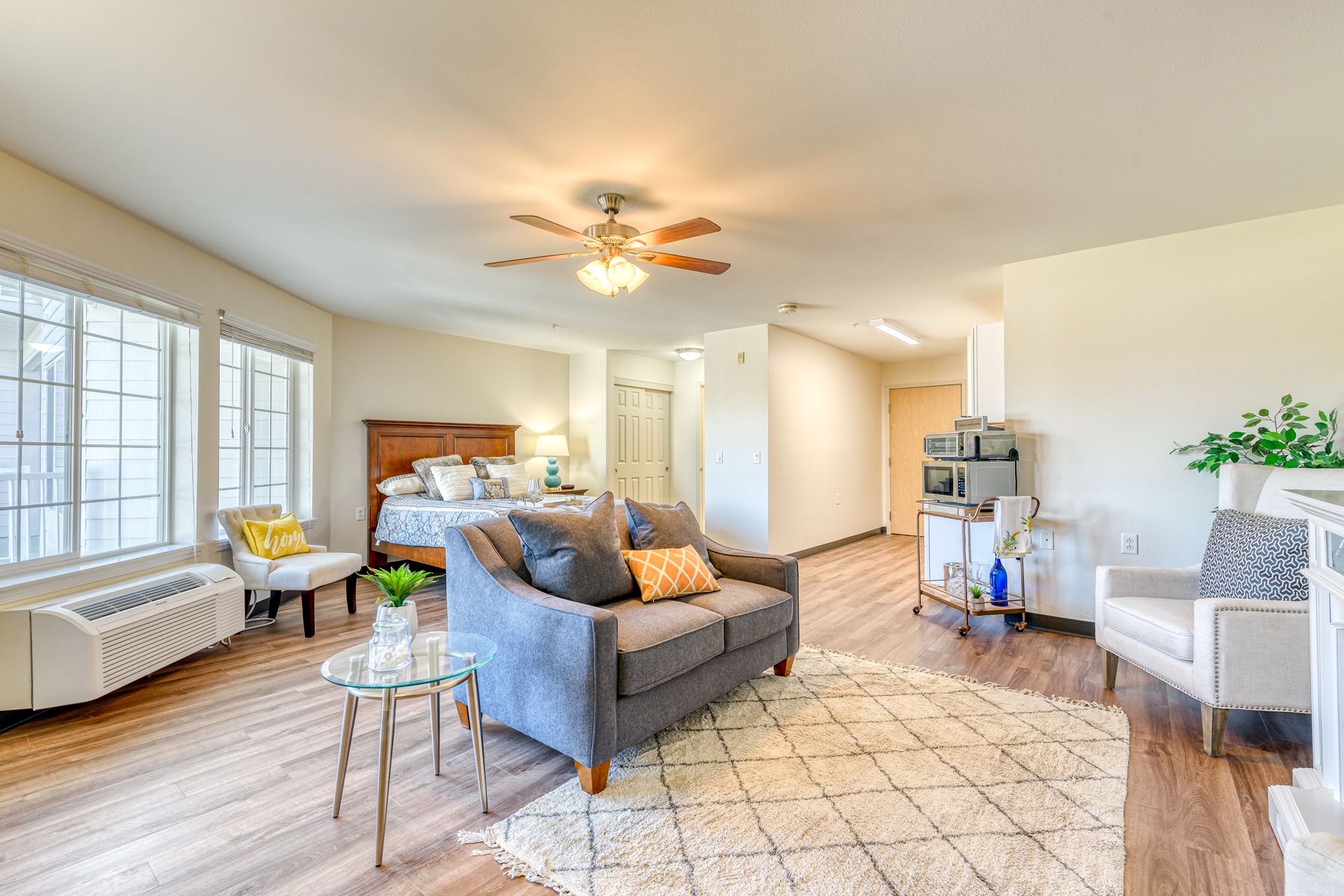 Bright interior of a resident room with cozy furnishings