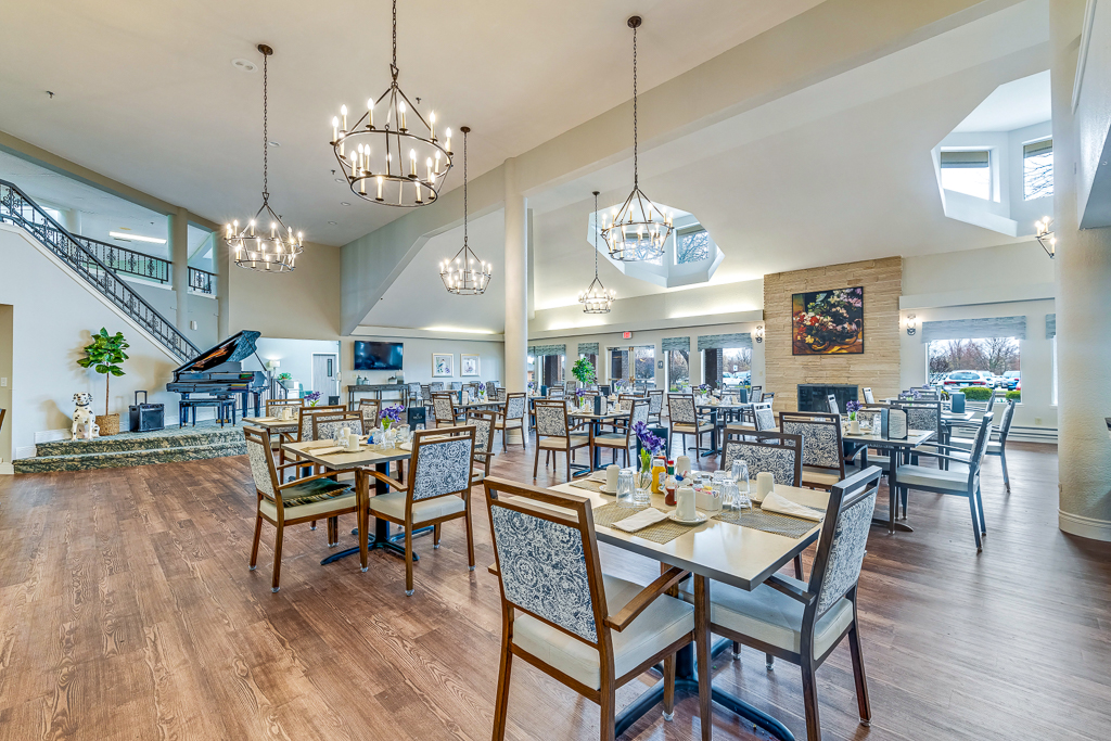 Bright dining area with elegant decor and tables set for meals.