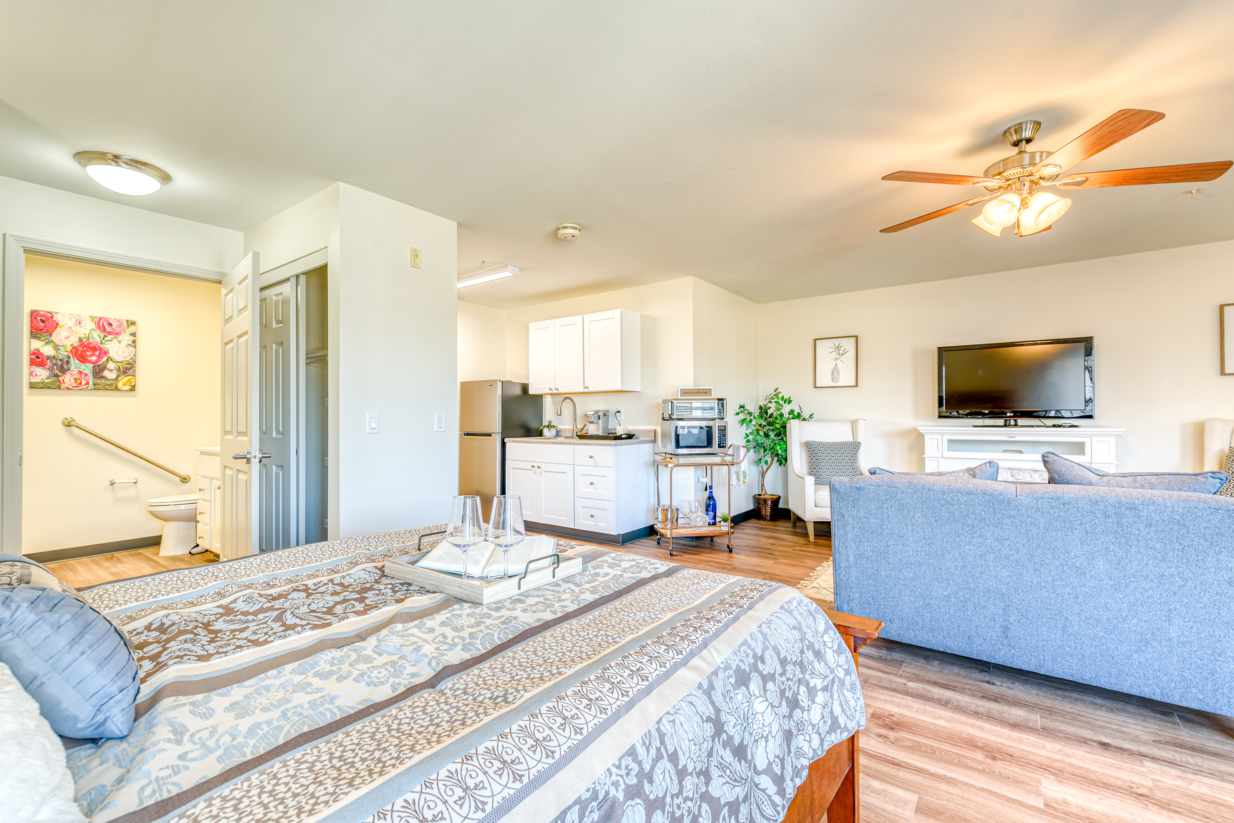 Bright, cozy resident room with a kitchenette