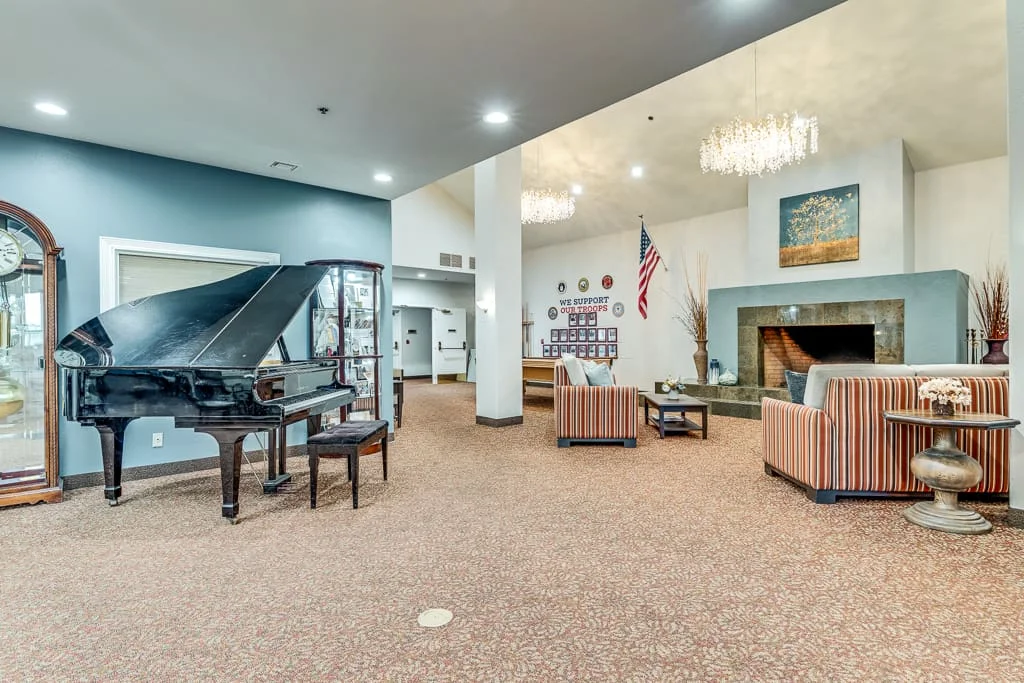Cozy common area with piano and seating