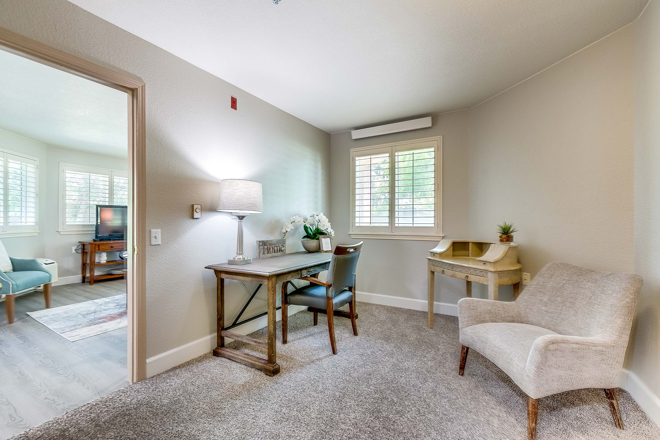 Cozy resident room with modern decor and furnishings
