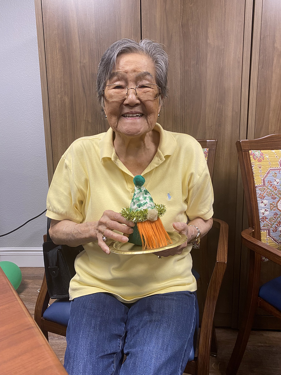 Senior resident making a craft during an activity